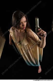 14 2018 01 BARBORA STANDING POSE WITH PISTOL AND SHOTGUN